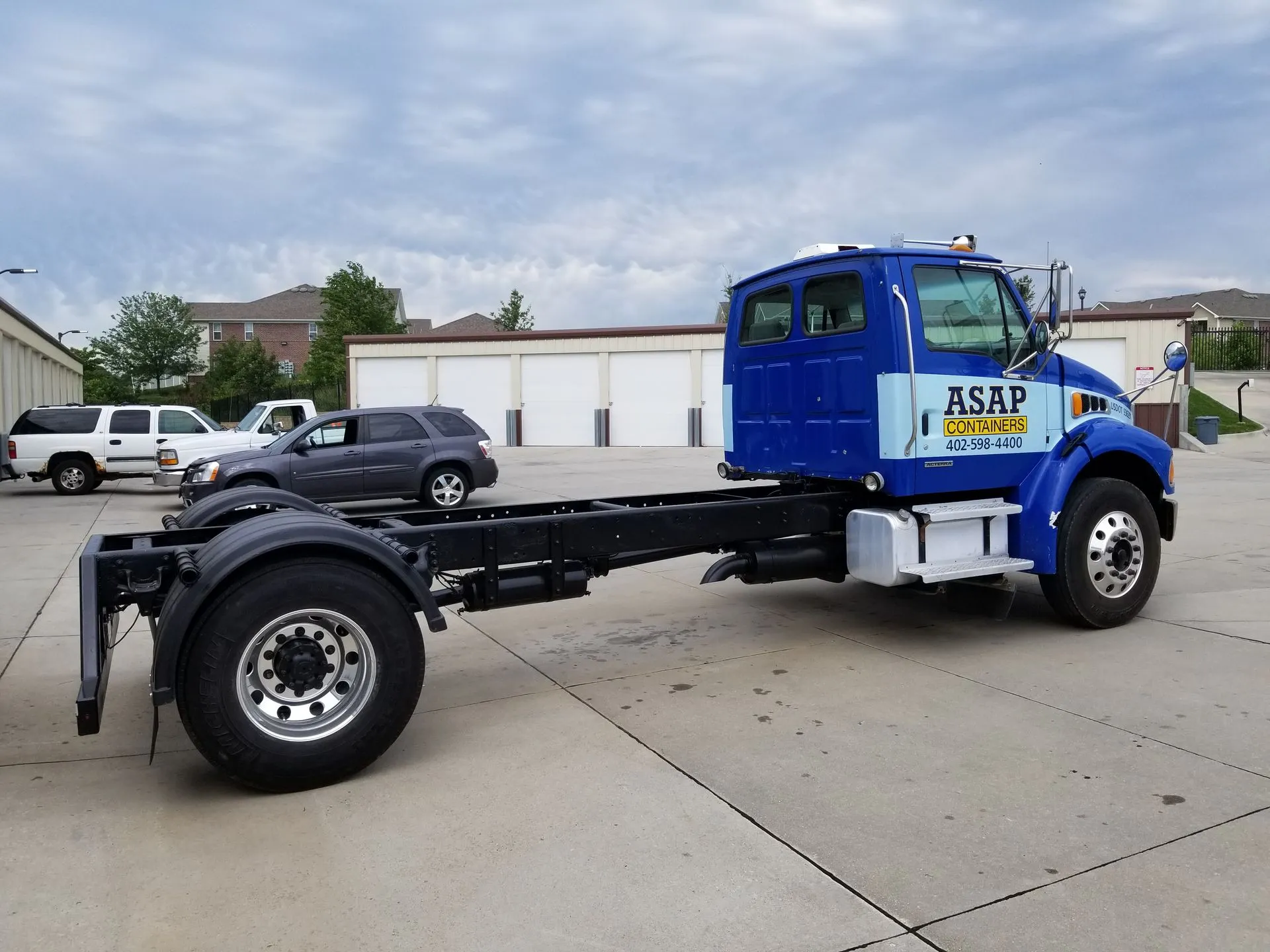 An ASAP Containers roll-off dumpster on a job site in Fremont, NE