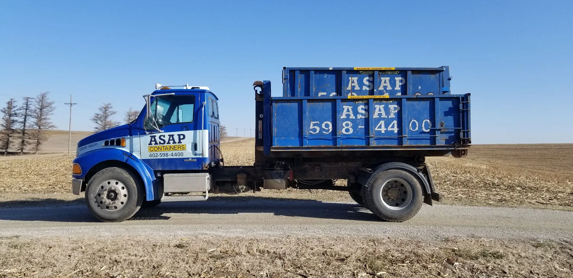An ASAP Containers roll-off dumpster delivered in Papillion, NE