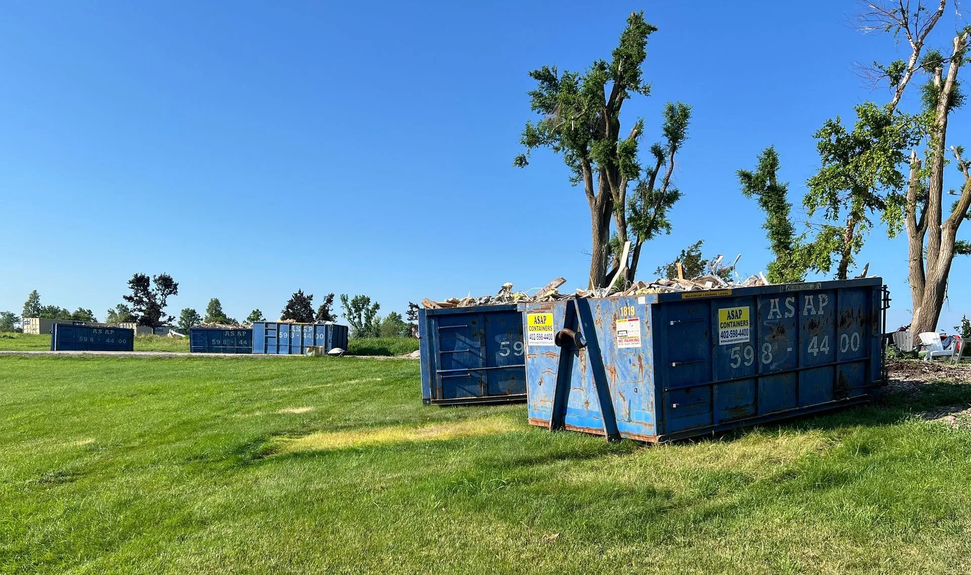 An ASAP Containers roll-off dumpster on a job site in Hastings, NE