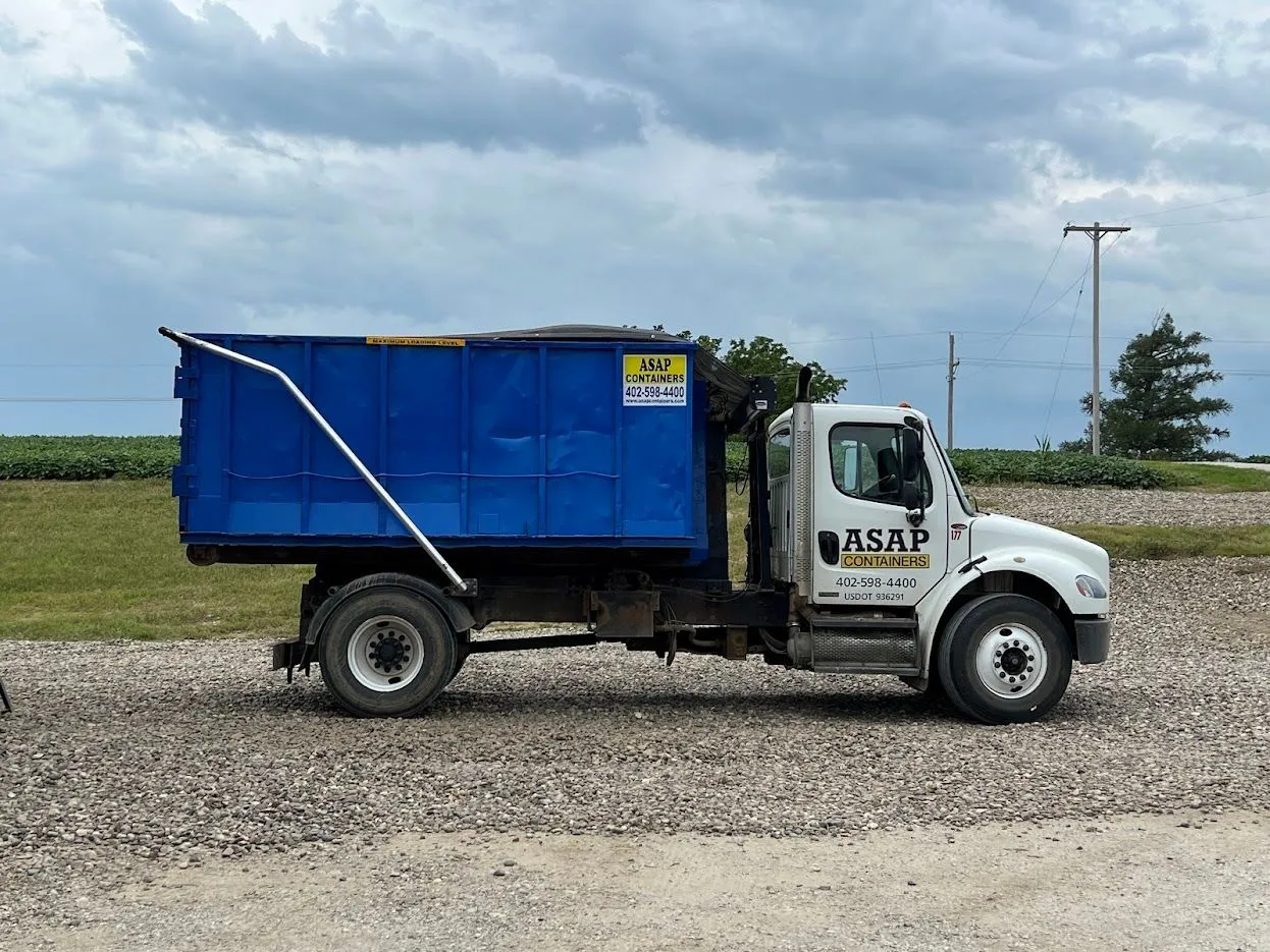 An ASAP Containers roll-off dumpster on a job site in Kearney, NE